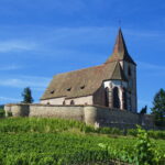 Eglise mixte Saint-Jacques-le-Majeur et son enceinte fortifiée